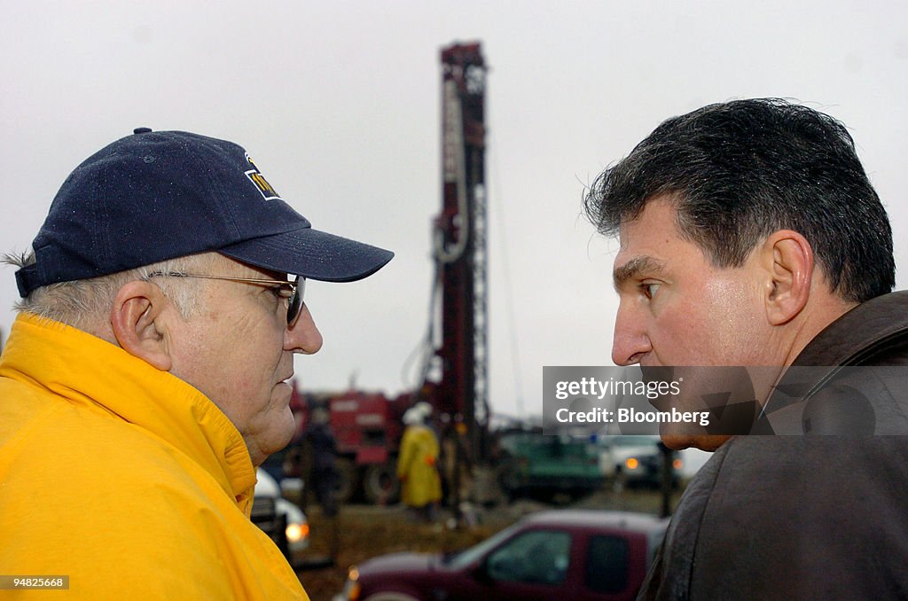 I.L. "Ike" Morris, left, president of Waco Oil and Gas talks