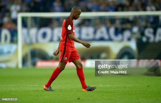 Gelson Fernandes of Frankfurt walks off the pitch after he gets the red card during the Bundesliga match between FC Schalke 04 and Eintracht...
