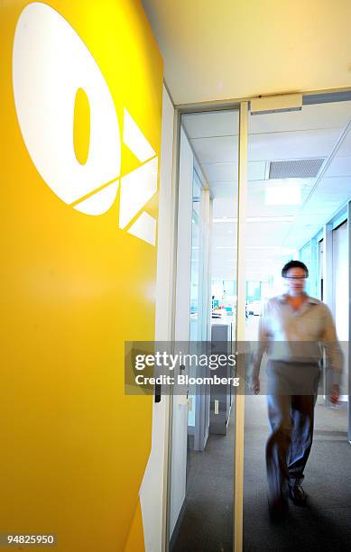 An employee walks through the reception area of OZ Minerals Ltd.'s headquarters in Melbourne, Australia, on Monday, Aug. 18, 2008. OZ Minerals Ltd.,...