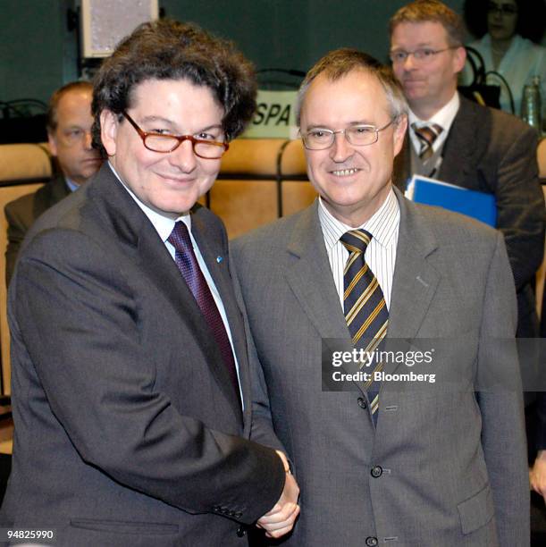 French Finance Minister Thierry Breton, left, greets German Finance Minister Hans Eichel at the opening of the Eurogroup meeting in Brussels, Belgium...