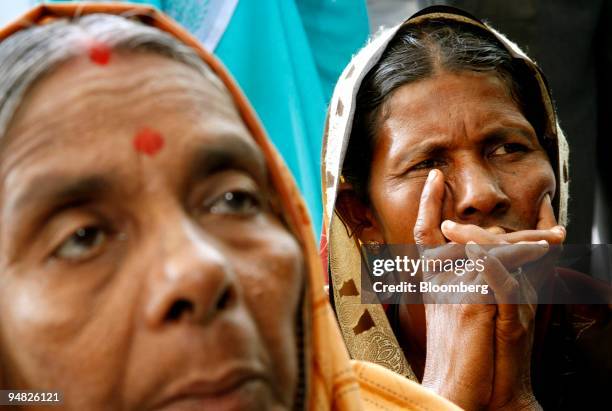 Women pray for victims of last year's tsunami in Velankanni, Tamil Nadu state, India, Monday, December 26, 2005. Thousands of mourners attended...