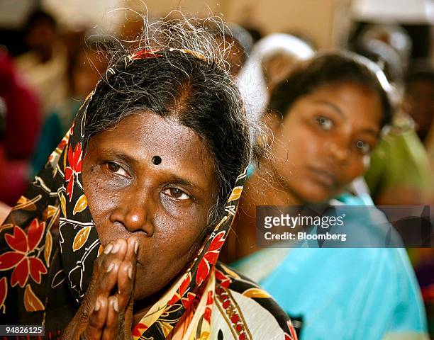 Women pray for victims of last year's tsunami in Velankanni , Tamil Nadu state, India, Monday, December 26, 2005. Thousands of mourners attended...