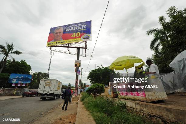 Daylife after the earthquake. Billboard With Presidential Candidate Charles Henri Baker, Port Au Prince, Haiti on November 4, 2010.