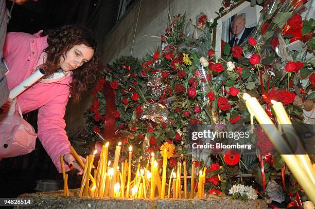 Mourner pays respects to former Yugoslavian president Slobodan Milosevic at a memorial in Belgrade, Serbia and Montenegro, Sunday, March 12, 2006....