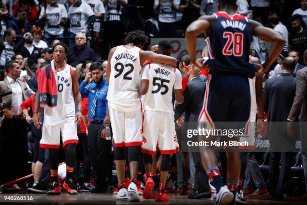 Lucas Nogueira and Delon Wright of the Toronto Raptors during the game against the Washington Wizards in Game Two of Round One of the 2018 NBA...