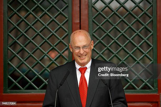 Henry Paulson, U.S. Treasury secretary, speaks at the Olympic Village where he presented the LEED "green building" award to Chen Zhili, vice mayor of...