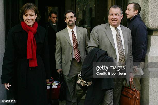 Lisa Bodensteiner, Calpine Corp. General counsel, left, Eric Pryor, Calpine Corp. CFO, center, and Robert May, Calpine Corp. CEO, right, exit a...
