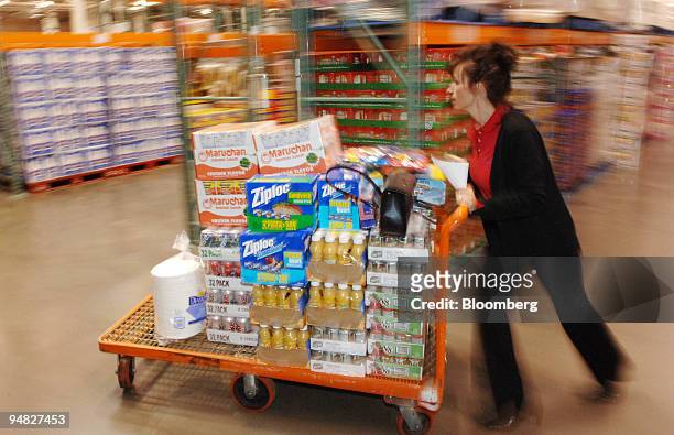 Lisa Socie shops for the Rocky Mountain Cancer Centers at a Costco store in Arvada, Colorado on Friday, December 9, 2005. Sales at U.S. Wholesalers...