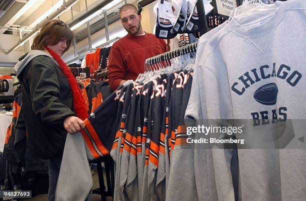 Jeremy Johnson shops with his mother Nancy Johnson for Chicago Bears merchandise at a Sports Authority store in Chicago, Illinois on Tuesday,...