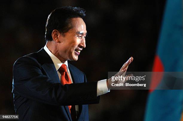 Lee Myung Bak, president of South Korea, waves to supporters during the Grand National Party convention in Seoul, South Korea, on Thursday, July 3,...