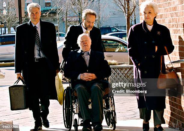 John McDarby, in wheelchair, arrives at the Atlantic City Civil Courts Building with Attorney Robert Gordon, left, Attorney Jerry Kristal, pushing...