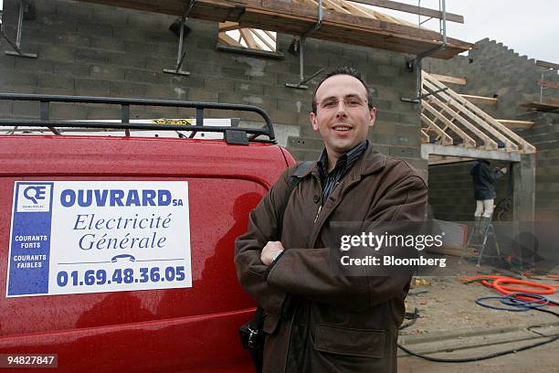 Eric Ouvrard, owner of the electricity company Ouvrard S.A., poses at the new building site "Le Champ du Heron" in Saint Aubin near Paris, France,...