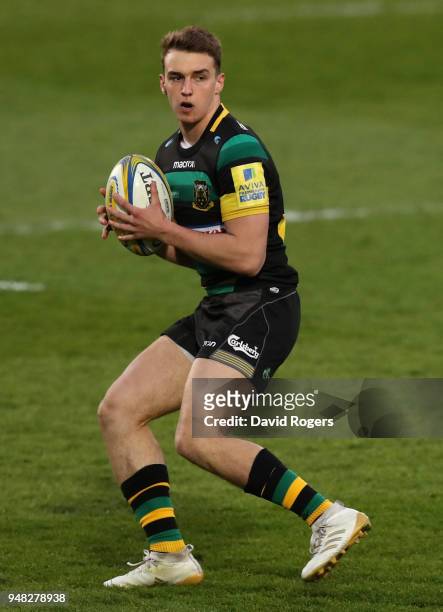 Tom Emery of Northampton Saints runs with the ball during the Mobbs Memorial match between Northampton Saints and the British Army at Franklin's...