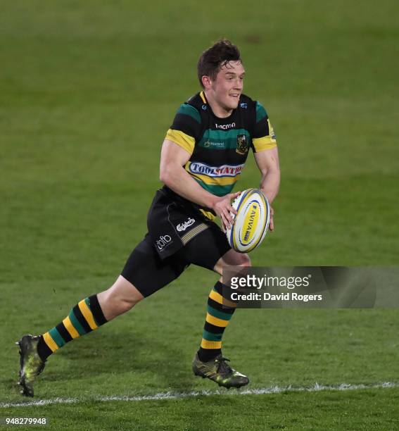 Jamie Elliott of Northampton Saints runs with the ball during the Mobbs Memorial match between Northampton Saints and the British Army at Franklin's...