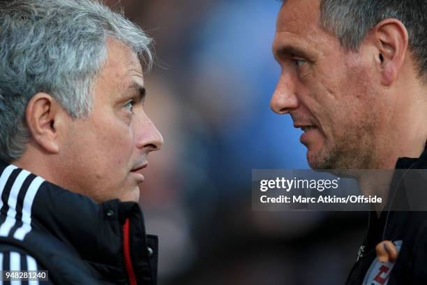 Jose Mourinho manager of Manchester United face to face with 4th official Andre Marriner during the Premier League match between Brighton and Hove...