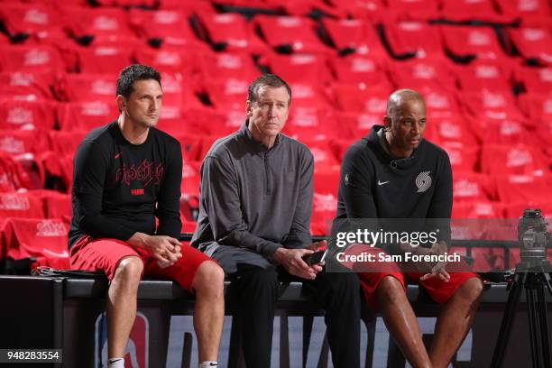 Assistant Coach Nate Tibbetts, Head Coach Terry Stotts, and Assistant Coach Dale Osbourne of the Portland Trail Blazers before the game against the...