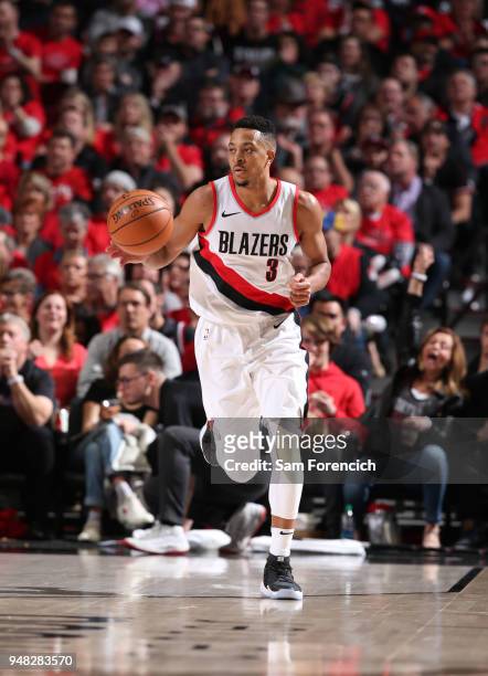 McCollum of the Portland Trail Blazers handles the ball against the New Orleans Pelicans in Game Two of the Western Conference Quarterfinals during...