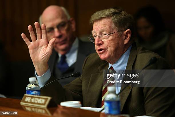 Senator Conrad Burns , right, questions Homeland Security Secretary Michael Chertoff during a Senate Appropriations Committee hearing Wednesday March...