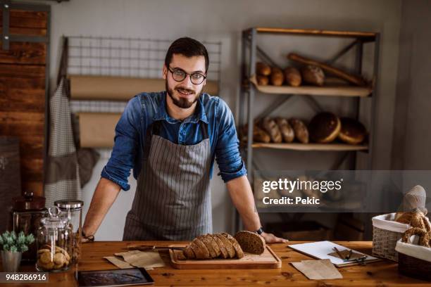 proud on his bakery business - bakery shop stock pictures, royalty-free photos & images
