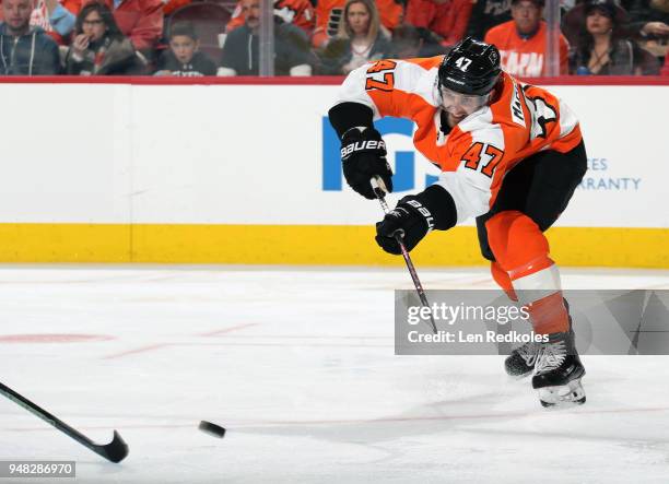 Andrew MacDonald of the Philadelphia Flyers passes the puck against the Pittsburgh Penguins in Game Three of the Eastern Conference First Round...
