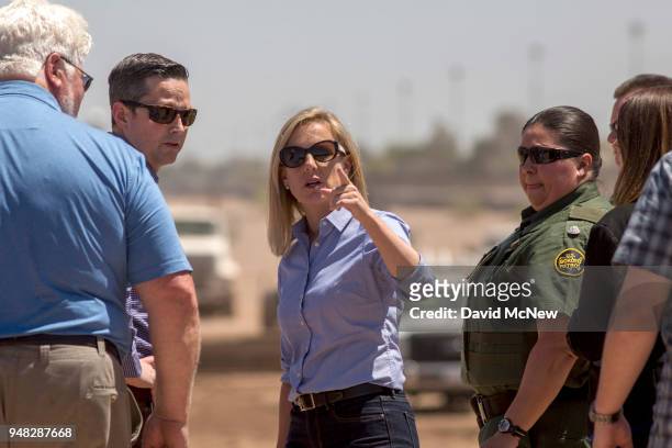 Department of Homeland Security Secretary Kirstjen Nielsen tours a replacement border wall construction site on April 18, 2018 in Calexico,...