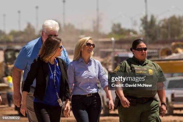 Department of Homeland Security Secretary Kirstjen Nielsen tours a replacement border fence construction site on April 18, 2018 in Calexico,...