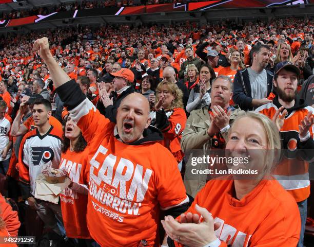 Fans of the Philadelphia Flyers celebrate a second period goal against the Pittsburgh Penguins in Game Three of the Eastern Conference First Round...