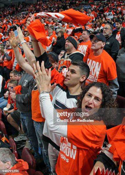 Fans of the Philadelphia Flyers celebrate a second period goal against the Pittsburgh Penguins in Game Three of the Eastern Conference First Round...