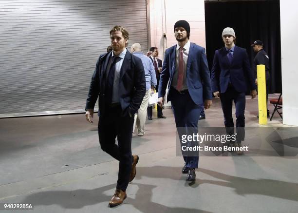 Blake Coleman, Pavel Zacha and Nico Hischier of the New Jersey Devils arrive for their game against the Tampa Bay Lightning in Game Four of the...