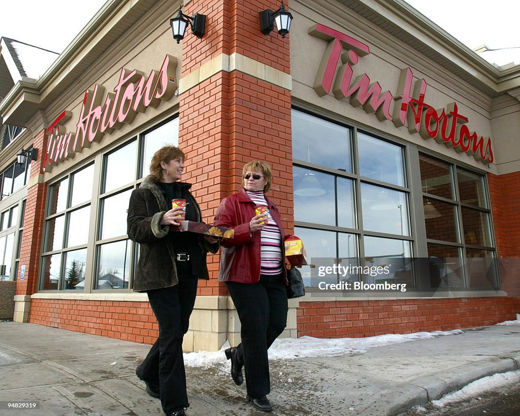 Customers Kim O'Brien, left, and Heather Arnfinson leave a C