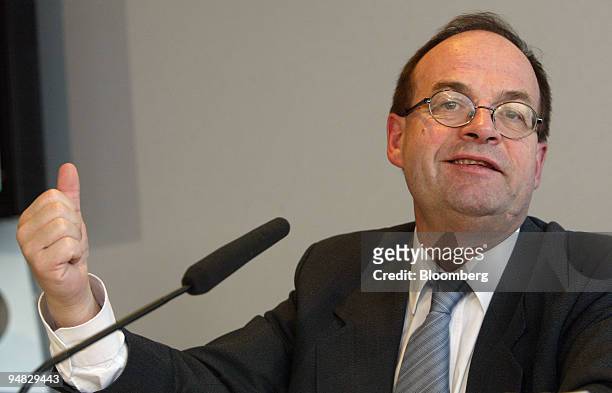 Peugeot Citroen Chief Executive Jean-Martin Folz gestures during the group's 2004 earnings press conference in Paris, France, February 23, 2005. PSA...