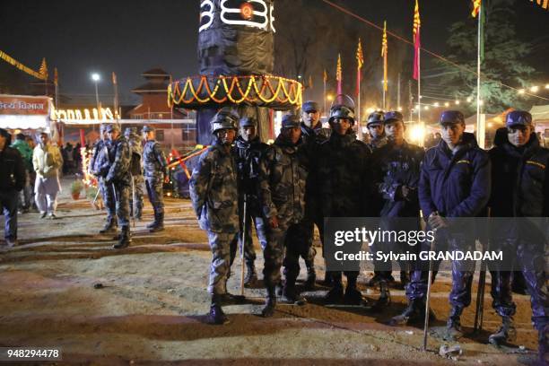 Nepal, City of Kathmandu, the Pashupati hinduist temple during the annual march 10th Maha Shivaratri festival at night, policemen monitoring //Nepal,...