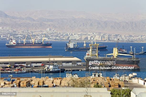 Overview on the harbour and Eilat in Israel. City of Aqaba on the red sea. Kingdom of Jordan.