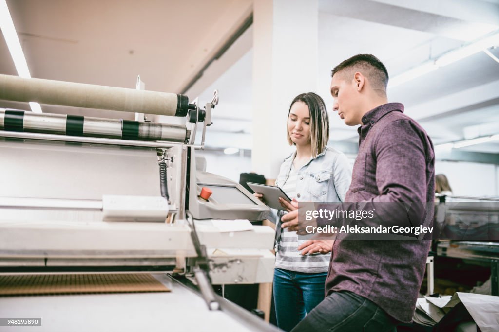 Team Working in Textile Factory on 3D Clothing Printing