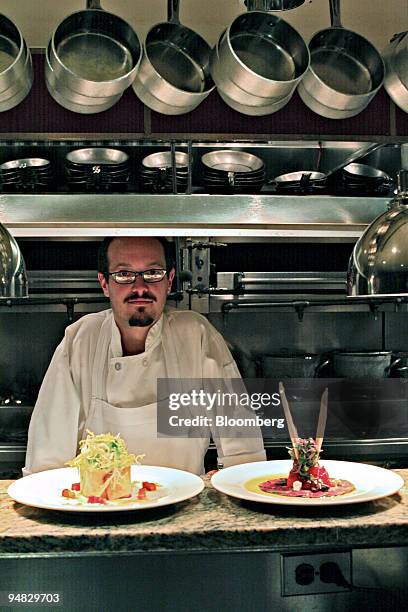 Chef Tom Valenti poses in the kitchen of Ouest, a restaurant on Broadway in New York, Monday, March 6, 2006.