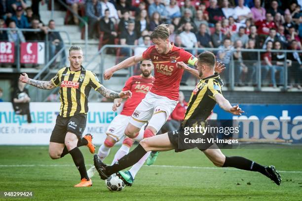 Alexander Buttner of Vitesse, Wout Weghorst of AZ, Matt Matthew Miazga of Vitesse during the Dutch Eredivisie match between AZ Alkmaar and Vitesse...