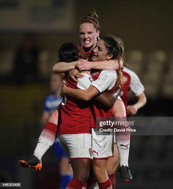 Danielle van de Donk celebrates scoring Arsenal's 3rd goal with Danielle Carter and Kim Little during the match between Arsenal Women and Reading...