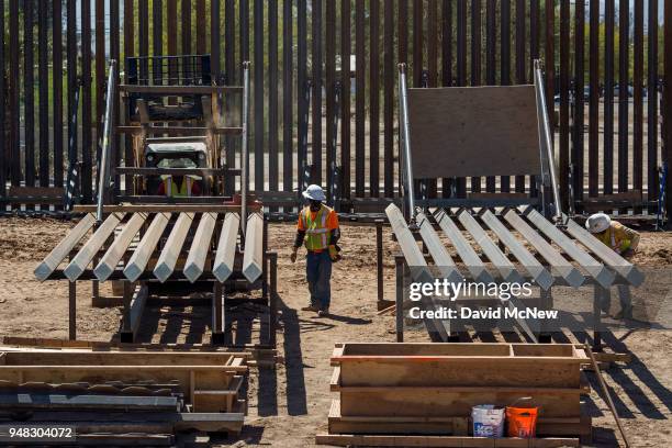 Construction of a new fence takes place as U.S. Department of Homeland Security Secretary Kirstjen M. Nielsen tours a replacement border fence...