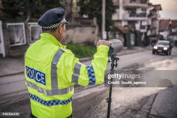 radar controle - lasergun stockfoto's en -beelden