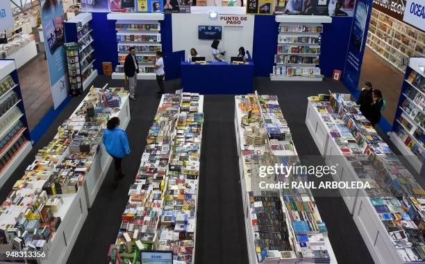 Visitors attend the XXXI International Book Fair of Bogota on April 18, 2018 in Bogota. Argentina is this year's guest of honour at the fair. / AFP...