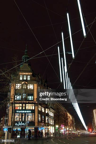 The new, tube-shaped Christmas decorations hang above Bahnhofstrasse in Zurich, Switzerland, Tuesday, December 13, 2005. Zurich's shoppers are up in...