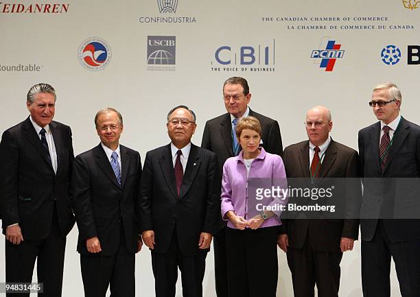 Business leaders pose during a photo session prior to the G8 Tokyo Business Summit in Tokyo, Japan, on Thursday, April 17, 2008. In the front row...