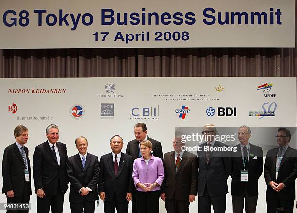 Business leaders pose during a photo session prior to the G8 Tokyo Business Summit in Tokyo, Japan, on Thursday, April 17, 2008. In the front row...