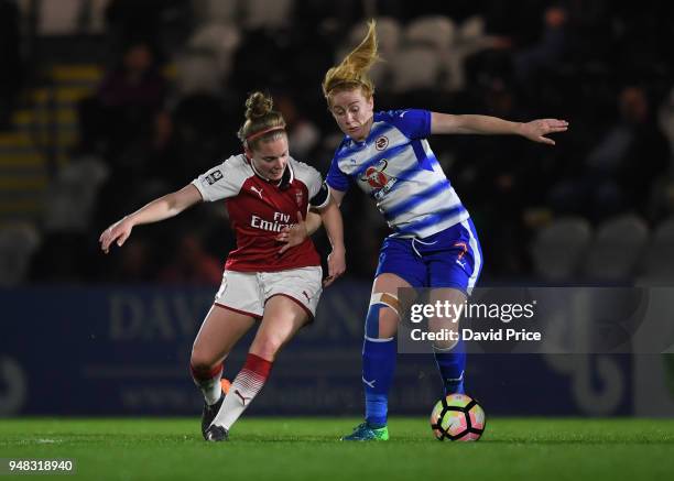 Kim Little of Arsenal challenges Rachel Furness of Reading during the match between Arsenal Women and Reading Women at Meadow Park on April 18, 2018...