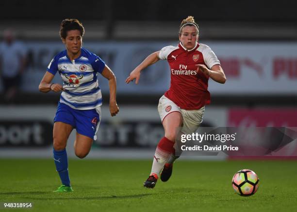 Emma Mitchell of Arsenal takes on Fara Williams of Reading during the match between Arsenal Women and Reading Women at Meadow Park on April 18, 2018...