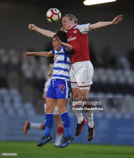 Louise Quinn of Arsenal challenges Brooke Chaplen of Reading during the match between Arsenal Women and Reading Women at Meadow Park on April 18,...