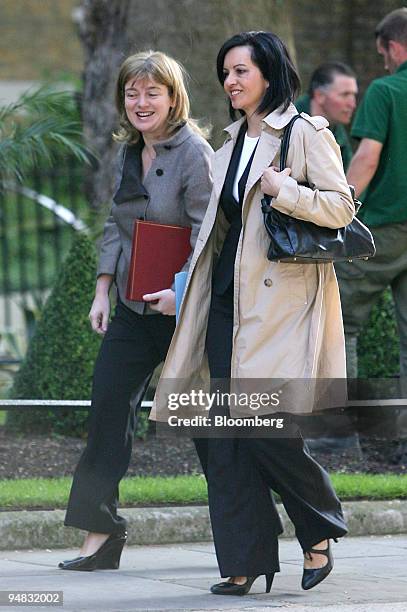 Ruth Kelly, U.K. Transport secretary, left, and Caroline Flint, U.K. Housing minister, arrive for the weekly cabinet meeting at number 10 Downing...