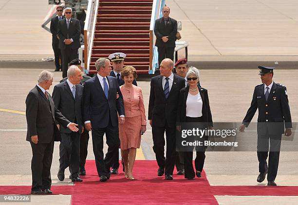 Left to right, Shimon Peres, Israel's president, U.S. President George W. Bush, First Lady Laura Bush, Ehud Olmert, Israel's prime minister, and his...