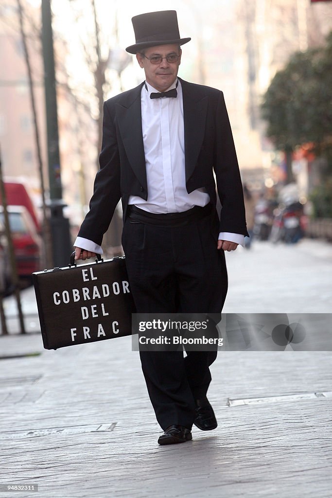 Fermin Puy, who works for Cobrador del Frac, a Madrid-based debt... News Photo - Getty Images