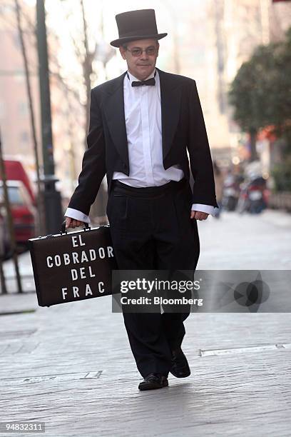 Fermin Puy, who works for Cobrador del Frac, a Madrid-based debt collection seen in Madrid, Spain, Tuesday, March 2, 2006. Spanish debt collectors in...